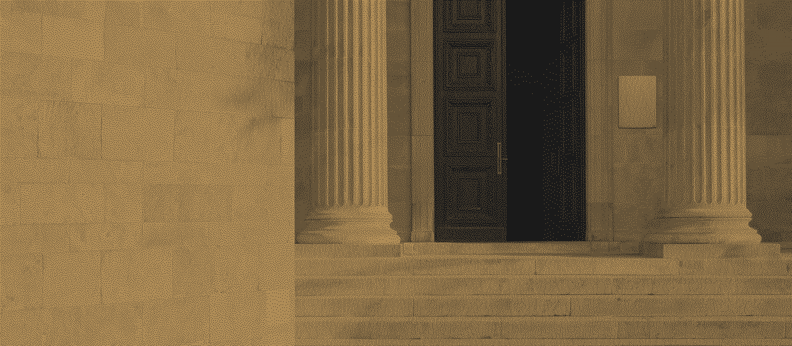 The carved entrance of a stone building between two columns, printed in gold dots on black